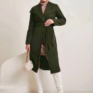 Wool jacket. It was too long for me and for reference I am 5ft.